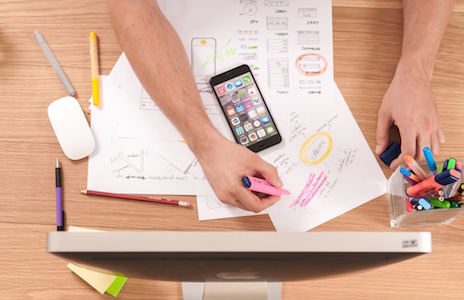 Photo of a Person Working at a Desk